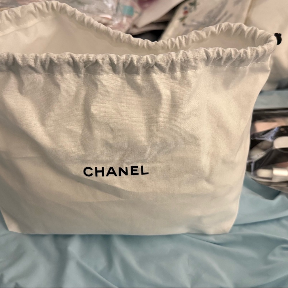 CHANEL Cream Drawstring Bag